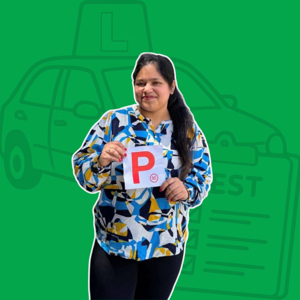 a woman smiling and  holding a card 